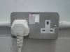 Damaged double socket outlet